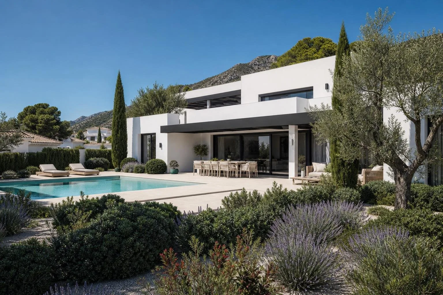 Vivienda moderna terminada con volúmenes blancos y jardín